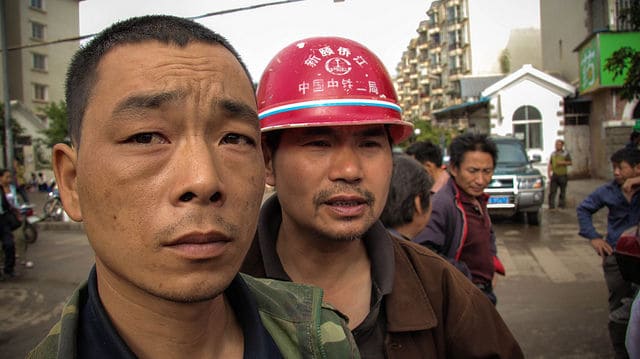 谁在帮农民工买春运车票？